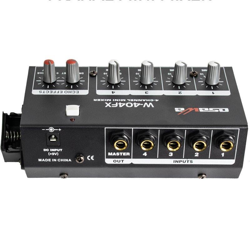 Osawa%20Mikrofon%20Giriş-1%20Line%20Çıkış%20Eko’Lu%204%20Kanal%2020%20Db%20Adaptörlü%20Mini%20Mikrofon%20Çoğaltıcı%20W-404FX